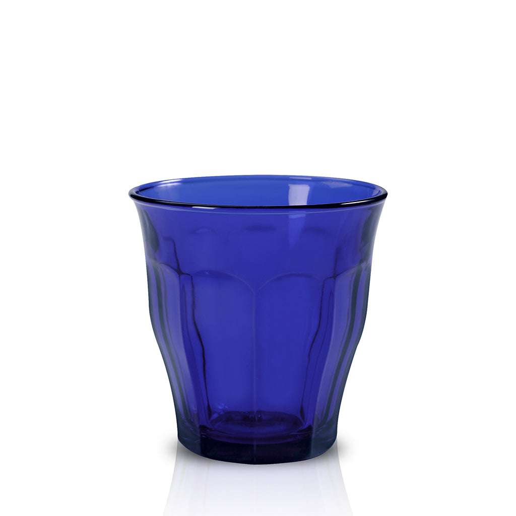 Le Picardie® Sapphire Glass Tumbler by Duralex, showcasing a deep sapphire blue color, perfect for serving drinks.