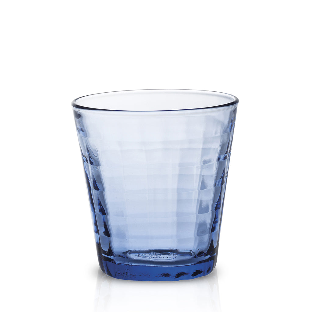 Duralex Prisme Marine Glass Tumbler in a marine blue color with a faceted checkered design, suitable for serving soft drinks, juice, and water.