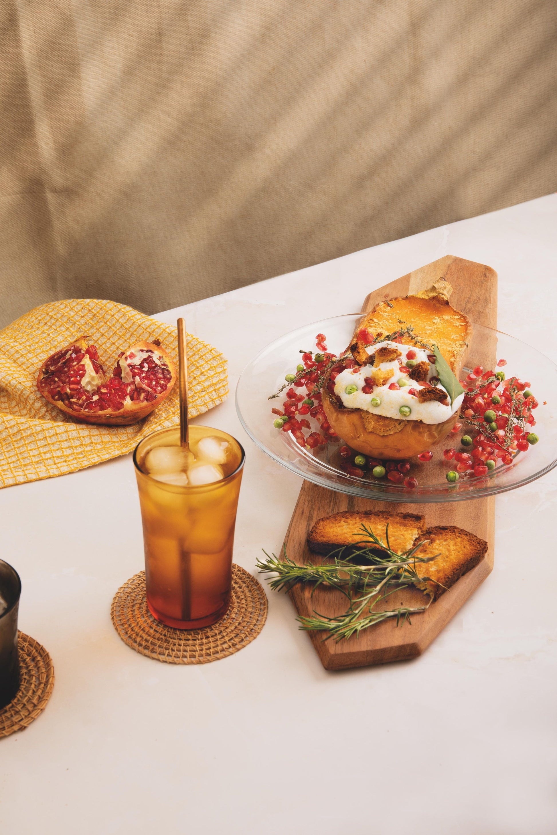 Duralex USA Lys Glass Dinnerware 18 Piece Set featuring a beautifully plated dish on a wooden serving board, complemented by a refreshing drink and garnishing.