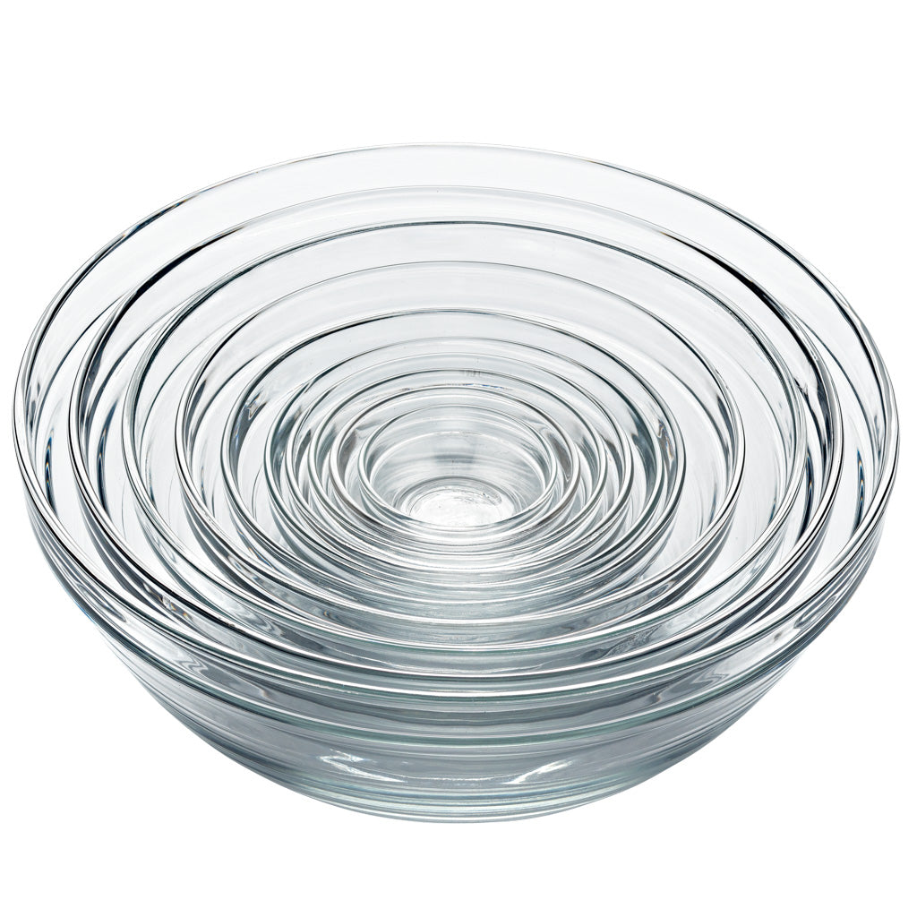 Le Gigogne® Clear Stackable Glass Bowl Set by Duralex USA, showcasing a nested design of clear glass bowls in a circular arrangement.