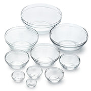Le Gigogne® Clear Stackable Glass Bowl Set by Duralex USA, featuring various sizes of transparent glass bowls arranged together.
