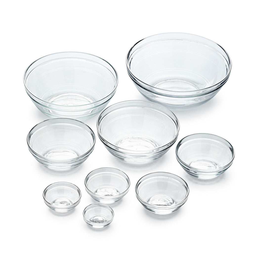 Le Gigogne® Clear Stackable Glass Bowl Set by Duralex USA showcasing 9 different sizes of transparent tempered glass bowls, ideal for food prep, mixing, and serving.
