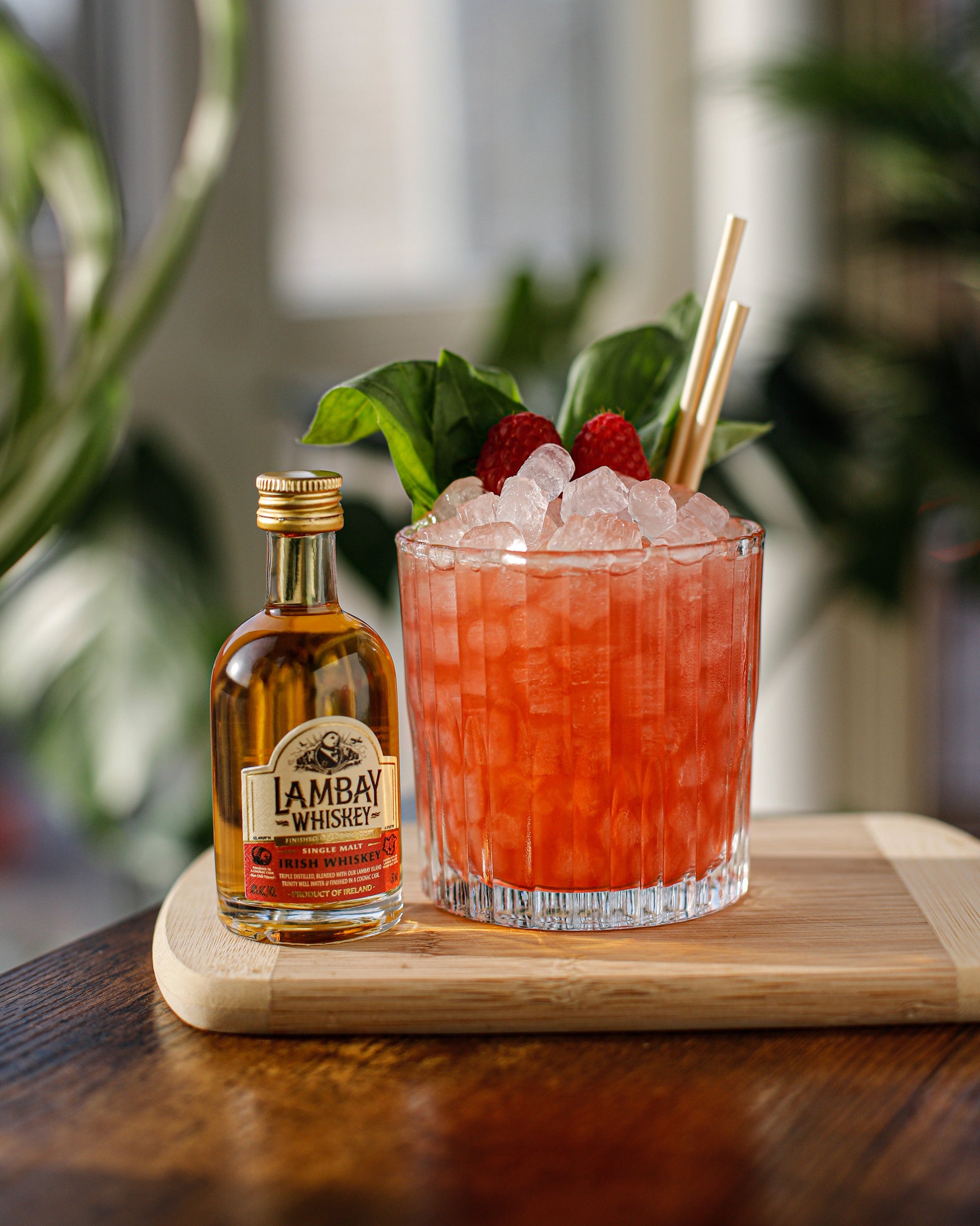 Manhattan Old Fashioned Glass - Set of 6 by Duralex, used in a cocktail setting with Lambay whiskey and fresh garnishes.